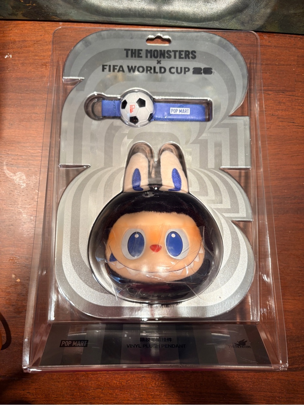 UNOPENED - POP MART The Monsters FIFA World Cup Vinyl Plush Pendant - Blue/Peach